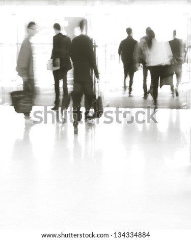 city business people moves in the office lobby, abstract blurred motion?Black and white images