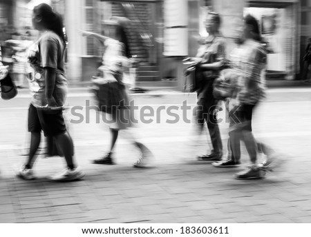Walking in the streets of the big city crowds, the rush of abstract black and white image