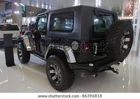GUANGZHOU, CHINA- OCT 2: Jeep Wrangler SUV on display at the Guangzhou Daily Baiyun International automobile exhibition on October 2, 2011 in Guangzhou, China.
