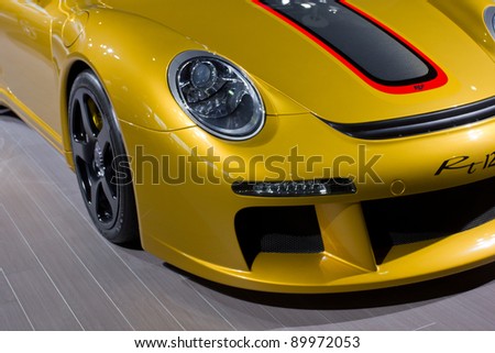GUANGZHOU, CHINA - NOV 26: RUF Rt12r car on display at the 9th China international automobile exhibition. on November 26, 2011 in Guangzhou China.
