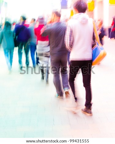 the students walking on campus in intentional motion blur