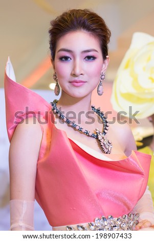 BANGKOK, THAILAND - SEPTEMBER 19, 2013 : Thai lady in fancy dress attends public event at Siam Paragon