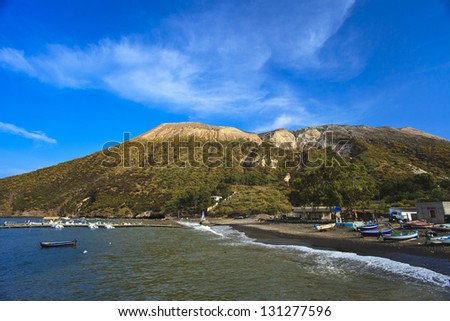 Vulcano Island shore line with boats, Aeolian Islands, Sicily.