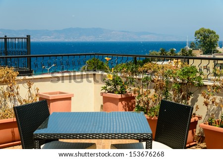 Table for two with panoramic sea-view