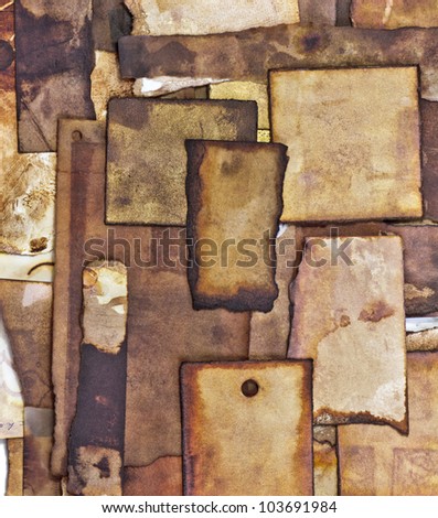wall of burned blank paper pieces and labels - weathered paper detail & structure