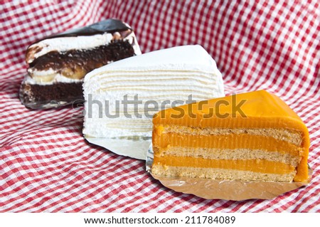 Thai tea cake, chocolate cream cake layer and Crepe cake