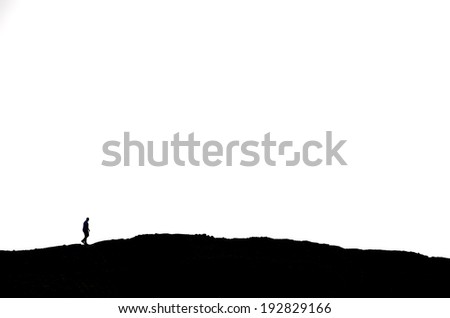 man hiking on a mountain in black with white background