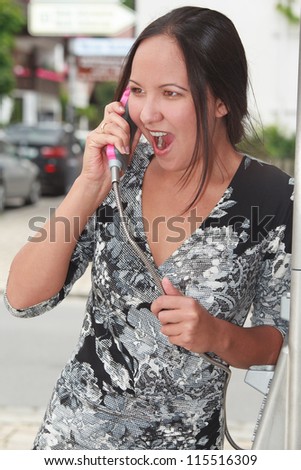 Telefoniert am payphone and shouts angrily into the phone / Mad woman on the phone