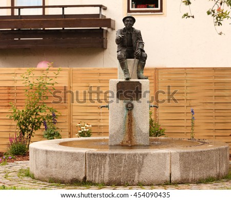http://image.shutterstock.com/display_pic_with_logo/748867/454090435/stock-photo-fountain-and-monument-at-the-birthplace-of-hausham-wastl-witt-454090435.jpg