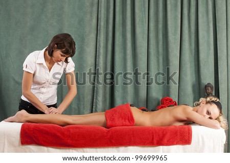 A massage with polished, heated stones / Relax with hot stone massage and