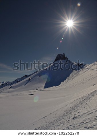 Mountain peak and sun star (Spitzmeilen 2501m)