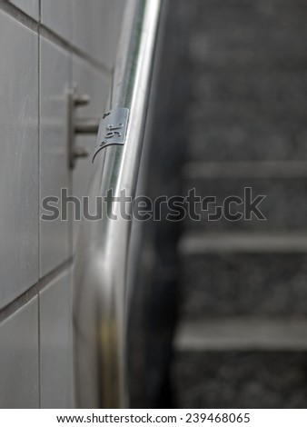 Handrail with track level engraving (Visually impaired people)