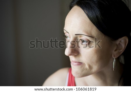 woman thinking with plain background for copy space