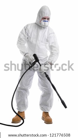 man in full protective clothing using pressure washer on white background