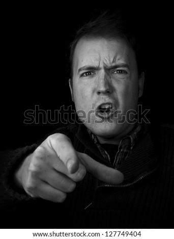 anger, man looking angry pointing finger black and white