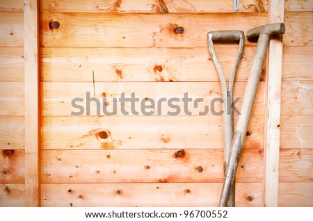 gardening tools in a garden shed with copyspace