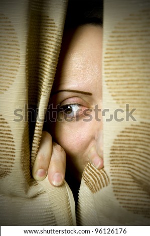 hide and seek, woman hiding behind curtains