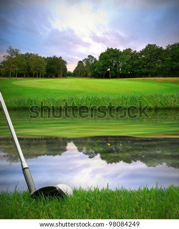 hitting golf ball over water hazard from fairway onto green