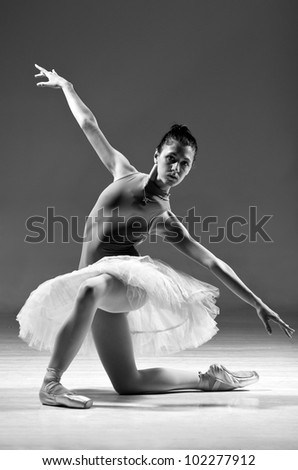 beautiful classic Ballet Dancer in white Tutu posing