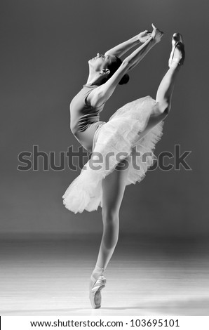 Beautiful Ballerina In White Tutu Doing Acrobatics