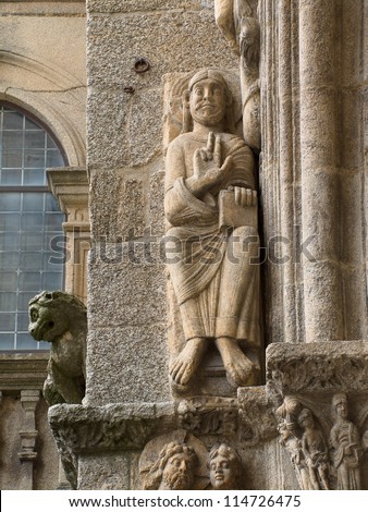 Romanesque Adam and Eve in Platerias facade in Saint James Compostela Cathedral