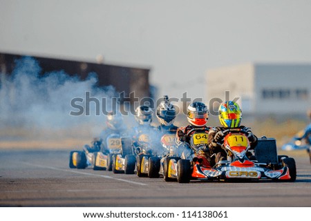 BUCHAREST ROMANIA AUGUST 4 Unknown pilots competing in National Karting Championship 2012 at Amkart Bucharest on August 4 in Bucharest Romania BUCHAREST ROMANIA AUGUST 4 Unknown pilots competing in National Karting Championship 2012 at Amkart Bucharest on August 4 in Bucharest Romania