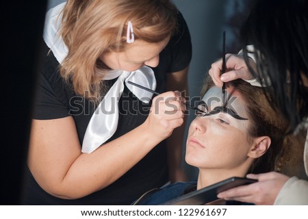 GALATI, ROMANIA - NOVEMBER 24: Make-up session in National Student Fashion Festival Extravagance on November 24, 2012 in Galati, Romania