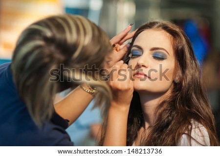 BUCHAREST, ROMANIA - JUNE 12: Make-up session at Bucharest Fashion Week in June 12, 2013 in Bucharest, Romania