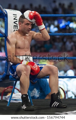 GALATI, ROMANIA - AUGUST 23: Ionut Trandafir got knocked out by Flavius Biea fight at the WBO welterweight title,  on August 23, 2013, in Galati, Romania.