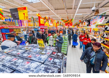GALATI, ROMANIA - NOVEMBER 21: Photos at Hypermarket Carrefour grand opening in Galati, Romania on November 21, 2013