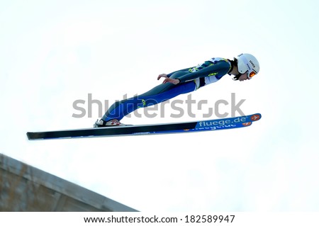 Rasnov, Romania - March 1: Unknown ski jumper competes in the FIS Ski Jumping World Cup Ladies on March 1, 2014 in Rasnov, Romania