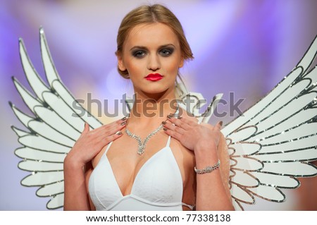 BUCHAREST, ROMANIA - MAY 7: Fashion model presents the Diamonds Collection in Bucharest Fashion Week at World Trade Center on May 7, 2011, Bucharest, Romania