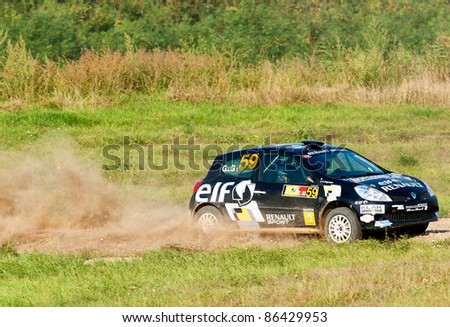 BUCHAREST, ROMANIA - SEPTEMBER 02: Unknown car driver piloting his car at Barsa Rally 2011 stage Shakedown at Ciolpani on September 02, 2011 in Bucharest, Romania