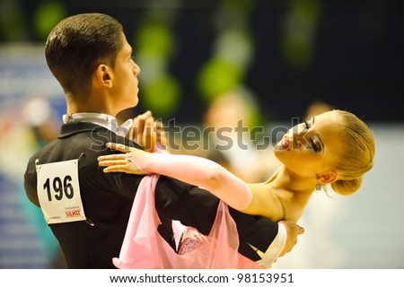 BUCHAREST, ROMANIA - MARCH 18: An unidentified dance couple in a dance pose at Ten Dance Championship, March 18, 2012 in Bucharest, Romania