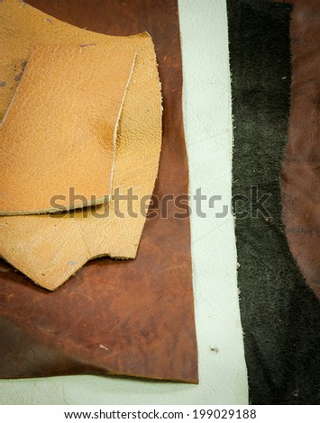 leather lined stacked on the floor.