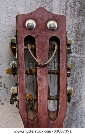 A header image of guitar. Placed upon the old walls.