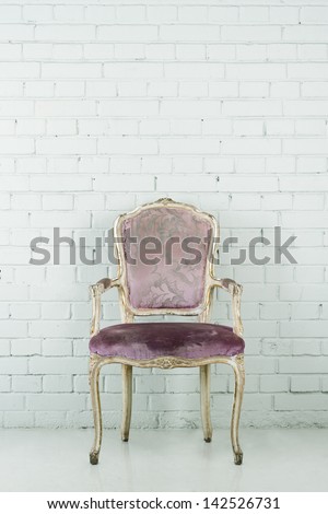 Vintage chair in empty room with copy-space