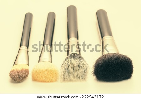 Makeup brushes close-up. Shallow DOF. Toned image