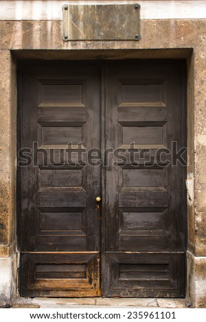 Vintage door with blank door-plate on the top