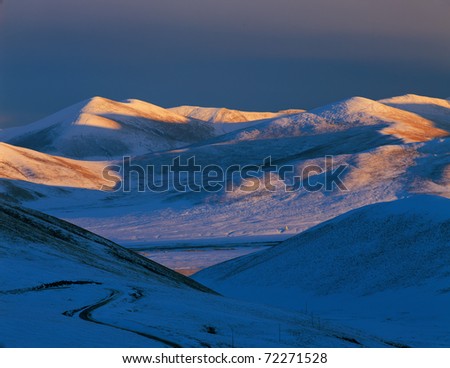 Snow mount in sunrise, view in Tibet