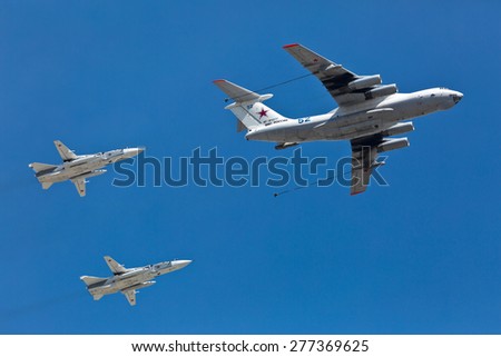 MOSCOW, RUSSIA - MAY 7,2015:Russian Air Force IL-78 air-to-air refueling tanker demonstrates in-flight refueling of Su-24M supersonic attack aircraft during rehearsal for Victory Day military parade