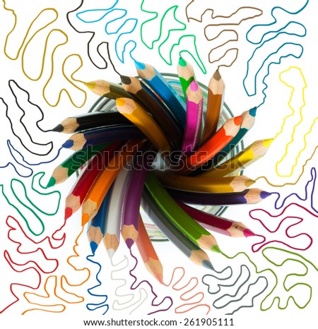 bunch of wooden color pencils in a glass with colored sketch lines