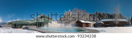 panorama of a modern swimming pool and sauna area at a wonderful winters day