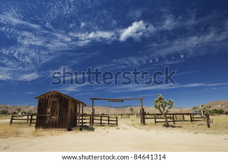 Wild west ranch entrance with blue summer sky