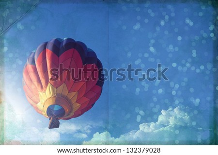 Hot air balloon paper texture, blue sky and light effect, vintage