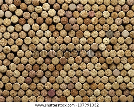 many different wine corks in the background, texture