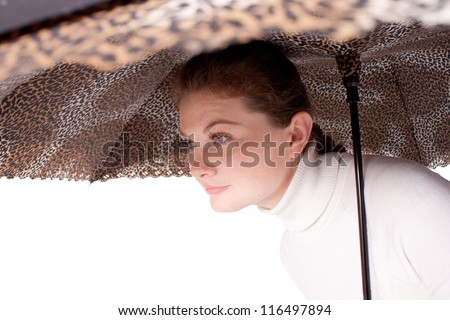 girl holding a big umbrella Brindle
