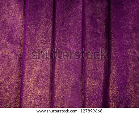 luxurious purple background with gold sequins