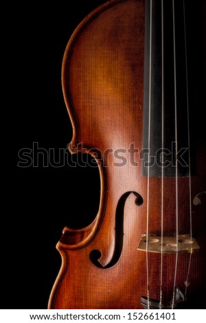 Low key image showing part of a violin