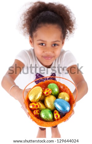African Asian girl holding chocolate ester egg, isolated on white background